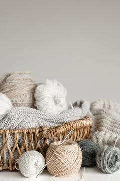 Basket with yarn close-up, threads for knitting. Stock Photos