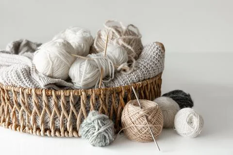 Basket with yarn close-up, threads for knitting. Stock Photos