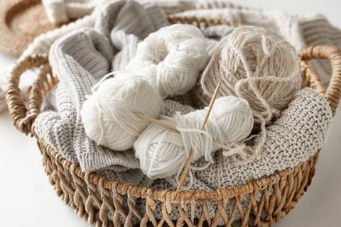 Basket with yarn close-up, threads for knitting. Stock Photos