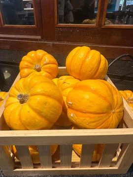 Basket of Yellow Pumpkins Stock Photos