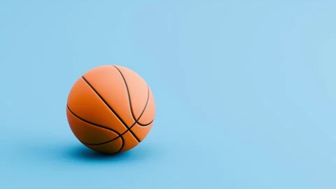 Basketball Ball Rolling from Left and from Right and Stopping on Blue Video stock 335288285