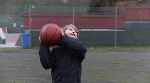 Basketball boy runs into focus Stock Footage 45587484