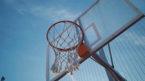 Basketball going into a basket 스톡 동영상 126709910