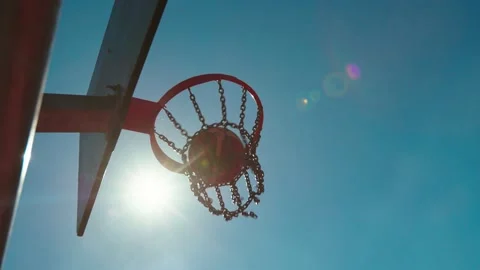 Basketball going through the basket in slow motion. Stock Footage 219862297
