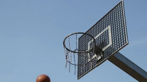 Basketball going through the hoop Slow motion Stock Footage 73976597