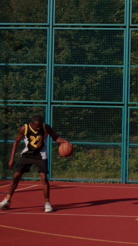 Basketball Hoop featuring a Ball positioned on the Court for a game of Stock Footage 314209217