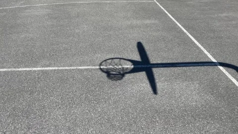 Basketball hoop shadow for documentary Stock Footage 281916669