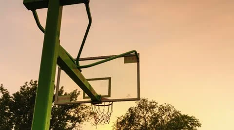 Basketball Hoop at sunset Stock Footage 12316548