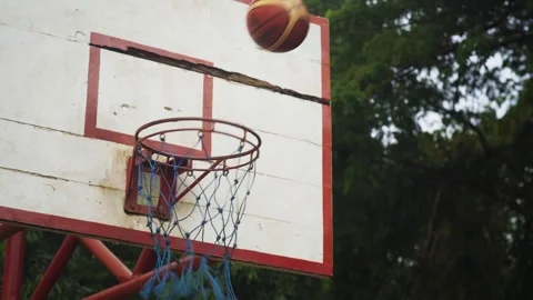 Basketball Missing Hoop and Bouncing Off Rim Stock Footage 345550999