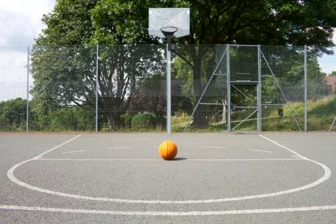 Under a Basketball Hoop with Overcast Day Stock Photo - Image of park,  ball: 163644886