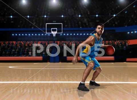 Basketball player in action on basketball playground Stock Photos