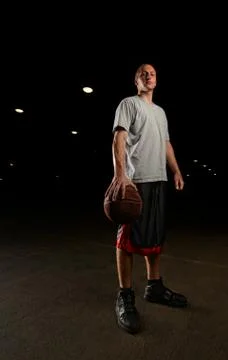 Basketball player with ball Stock Photos