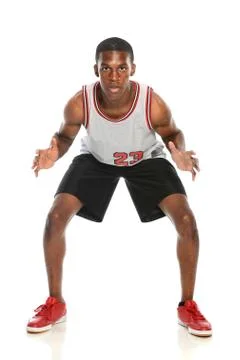 Basketball player defending Stock Photos