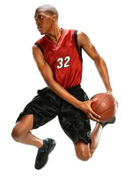Basketball player dunking ball Stock Photos