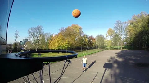 Basketball player making a 3 point jump shot in slow motion Stock-Footage 32663366