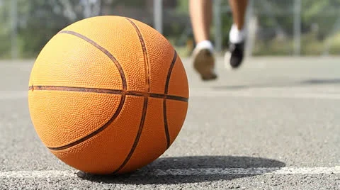 Basketball Player Picking up the Ball Stock Footage 26367473