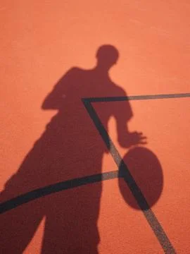 Basketball player shadow Stock Photos