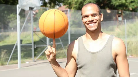 Basketball Player Spinning the Ball Stock Footage