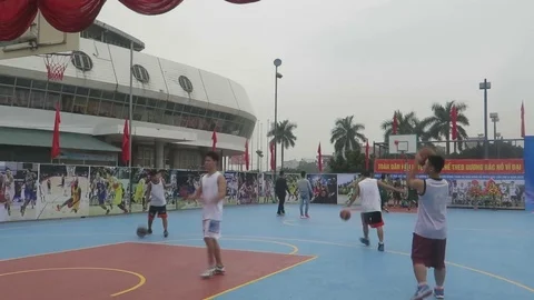 The basketball players practice Stock Footage 70614138