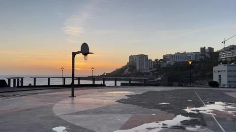 Basketball ring by the sunset beach empty court 動画素材 251951571