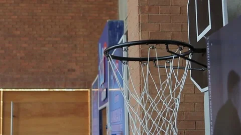 Basketball thrown in net Stock Footage 77053429