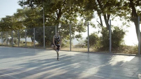 Basketball throws ball into the basket. The player makes a successful throw. The Stock Footage 112178043