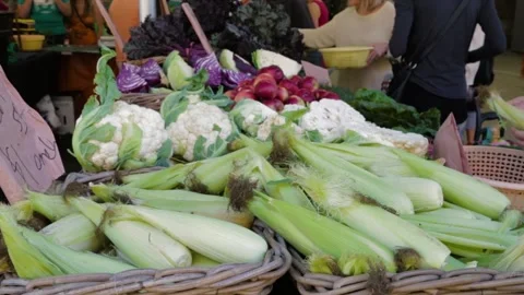 Baskets of Fresh Vegetables and Shoppers at Sydney Market in Australia Stock Footage 345705917