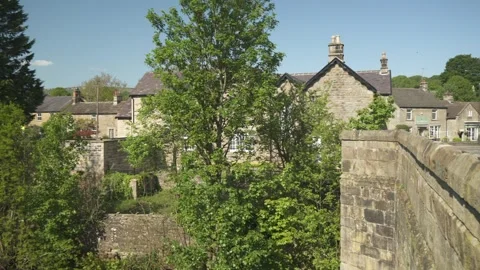 Baslow and river Derwent during spring, Derbyshire, England Stock Footage 242011853
