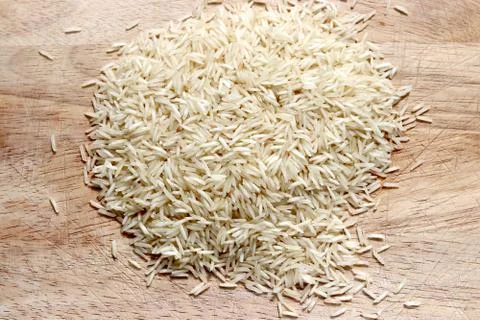 Basmati Rice on chopping board Stock Photos