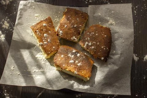 Basque cheesecake on the table in the sun Stock Photos