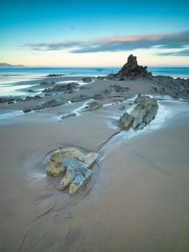 Basque coast flysch at sunset - A long-exposure shot of the dramatic, jagge.. Stock Photos