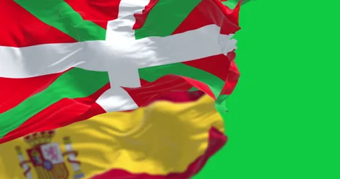Basque Country and Spanish flags waving isolated on green background Stock-Footage 328165846