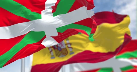 Basque Country and Spanish flags waving in the wind Stock-Footage 330173358