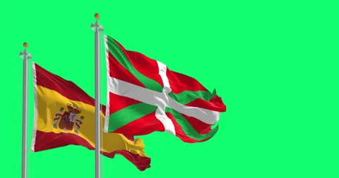 Basque Country and Spanish flags waving isolated on green background 스톡 동영상 337949354