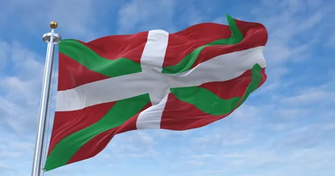Basque Country flag with flagpole waving in rolling clouds looping, 4K Loop Stock Footage 288707642
