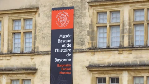 Basque museum sign on the wall of the building in Bayonne, France Stock Footage 283478638