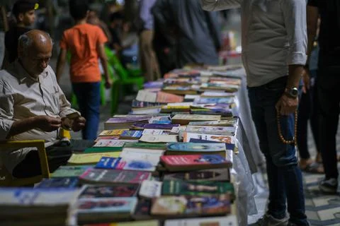 Basra, Iraq - April 8, 2022: photo of books and arts in Al-Farahidi streeet i Stock Photos