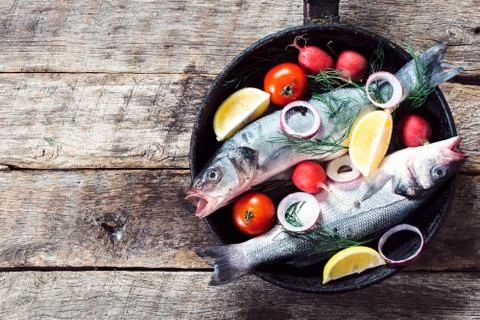 Bass fish in the pan Stock Photos