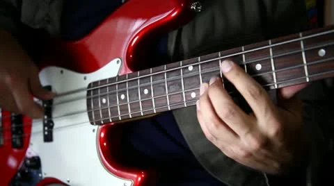 Bass guitar player close up left and right hand Stock Footage 21439849