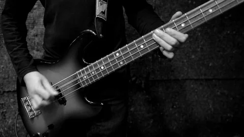 Bass guitar player Stock Footage 75097477