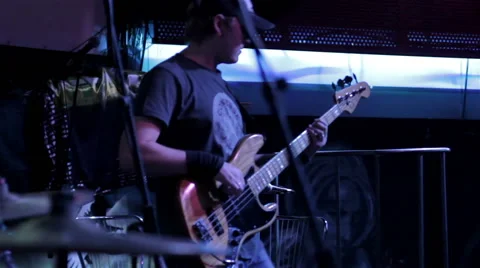 Bass guitar player on a stage Stock Footage 47842003