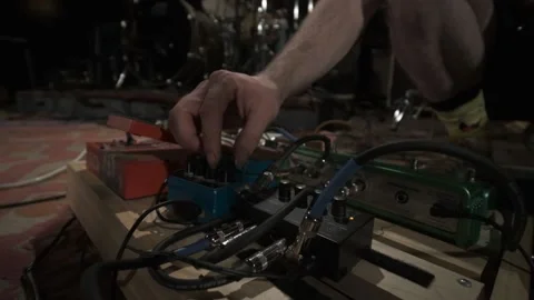 Bass Player Adjusts Knobs Slow Motion Video stock 159818334