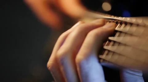 Bass player; five string electric bass guitar; practice; play;  Stock Footage 35910405