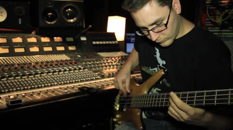 Bass player jamming in Recording Studio As 28 Stock Footage 35311979