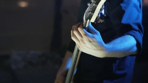 Bass player medium shot at a live concert 動画素材 82284098