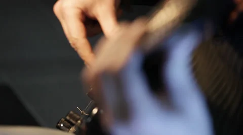 Bass player; playing; five string electric bass Stock Footage 35910528