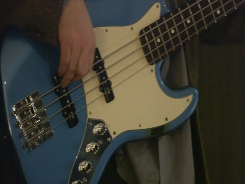 Bass Player Strumming Close Up Stock Footage 74345531