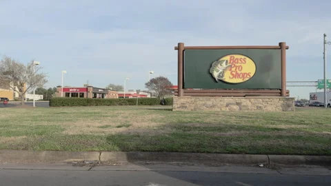 Bass Pro Shops sign at intersection in Charlotte NC 4k Stock Footage 332958068