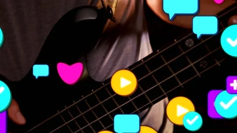 Bassist playing, sliding neck in studio, each pluck spawning icons covering bass Video stock 331872767