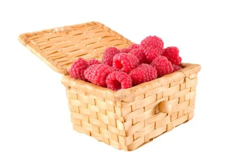 Bast-basket with a raspberry Stock Photos